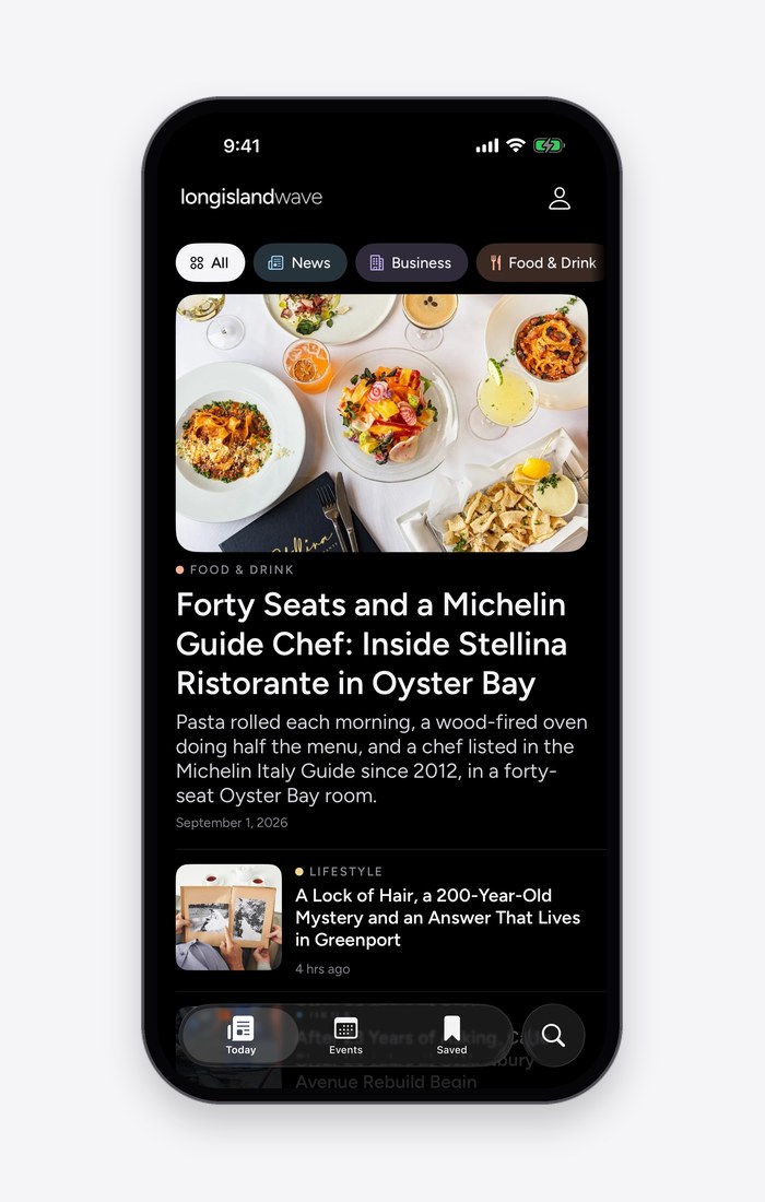 The Long Island Wave app in dark mode, its front page led by the Stellina Ristorante feature.